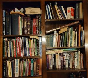 lot 28 image: Large lot of assorted books including cookbooks as shown. Generous count