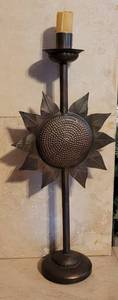 lot 48 image: Decorative metal sunflower candle holder with candle as shown.