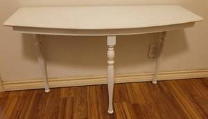 lot 57 image: Vintage 3 legged accent table in style, color, and condition shown.