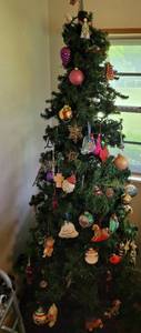 lot 61 image: Decorated Christmas tree as shown.