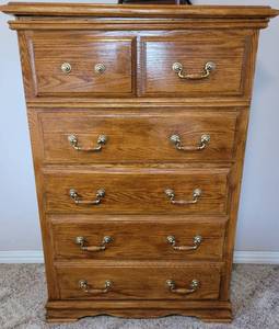 lot 63 image: Wooden chest of drawers in style, color, and condition shown.