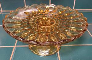 lot 72 image: Vintage footed glass cake standplatter in style, color, and condition shown.