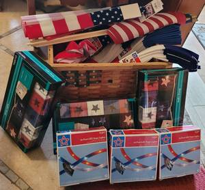 lot 103 image: Large lot of 4th of Julypatriotic themed LED rope lights, string lights, buntings, and flags as shown. Check it out