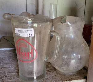 lot 121 image: Assorted glass platters, pitchers and more as shown.