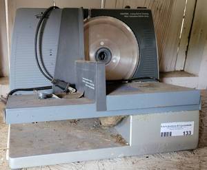lot 133 image: Electric meat slicer as shown.