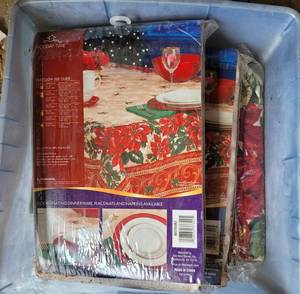 lot 135 image: Lot of table covers in packages as shown. Approx. 5 total.