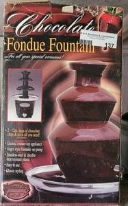 lot 137 image: Chocolate fondue fountain with box as shown.