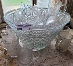 lot 142 image: Punch bowl and cups as shown.