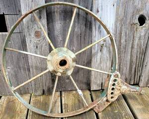 lot 149 image: Vintage wagon wheel as shown. Approx 18in diameter.