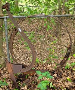 lot 154 image: Agricultural tool plus wagon wheel rim as shown.