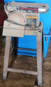 lot 209 image: Craftsman 6 Disc Sander on stand as shown.