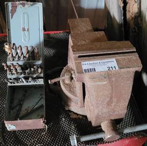 lot 211 image: Vintage Vise And Drill Bits as shown.