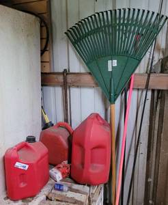 lot 223 image: Gas Cans, Crow Bar, Rake and more as shown.