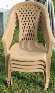 lot 274 image: Lot of 4 plastic chairs as shown. (Your bid x 4)
