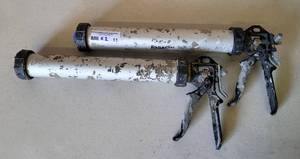 lot 11 image: LOT OF 2 WEDI SEALANT  SAUSAGE CAULKING TUBE GUNS AS SHOWN. (YOUR BID X 2)