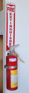 lot 25 image: FIRE EXTINGUISHER WITH SIGN AS SHOWN. BUYER MUST BRING TOOLS FOR PROPER REMOVAL