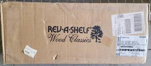 lot 39 image: REV-A-SHELF 5 PULLOUT WALL CABINET WITH ADJ & REV BASE IN BOX AS SHOWN.