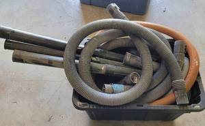 lot 70 image: LOT OF VARIOUS VACUUM HOSES AND ACCESSORIES AS SHOWN.