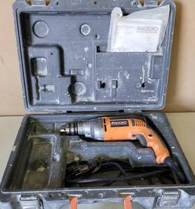 lot 74 image: RIDGID 12 VARIABLE SPEED ELECTRIC DRILL WITH STORAGECARRYING CASE AS SHOWN.