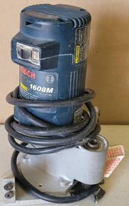 lot 106 image: BOSCH 1609 CORDED TRIM LAMINATE ROUTER AS SHOWN.