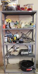lot 134 image: METAL SHELVING UNIT AS SHOWN. APPROX. 36 W x 16 D x 69 H. SHELF IS BOLTED TO THE WALL. BUYER MUST BRING TOOLS FOR PROPER REMOVAL. CONTENTS NOT INCLUDED