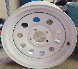 lot 135 image: FIVE LUG TRAILER TIRE WHEEL AS SHOWN.