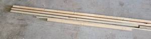 lot 144 image: LOT OF WOOD IN VARIOUS SIZESLENGTHS AS SHOWN. LONGEST PIECE APPROX. 148 LONG AND SHORTEST APPROX. 49 LONG.