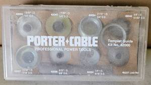 lot 157 image: 9 PIECE PORTER CABLE PROFESSIONAL POWER TOOLS TEMPLATE GUIDE KIT 42000 AS SHOWN.