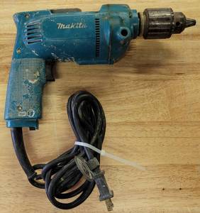lot 179 image: MAKITA 6302 12 VARIABLE SPEED DRILL AS SHOWN.