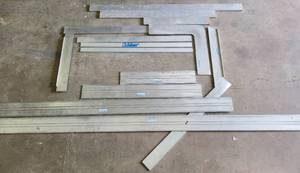 lot 190 image: THE PINSKE EDGE ALUMINUM STRAIGHT EDGE PIECES IN VARIOUS STYLESANGLES AS SHOWN. LONGEST PIECE APPROX. 150 LONG. SHORTEST PIECE APPROX. 31. (YOUR BID X 13)