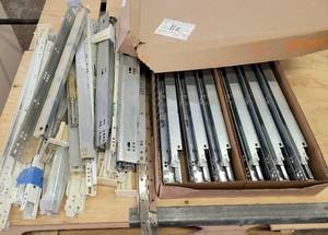 lot 240 image: LOT OF DRAWER RUNNERS INCLUDING ONE FULL BOX AS SHOWN.