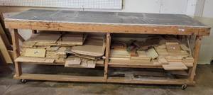 lot 262 image: LARGE SIZE SHOP-MADE WORKTABLE ON WHEELS AS SHOWN. APPROX. 96 L x 30 W x 36 H. CONTENTS SHOWN NOT INCLUDED