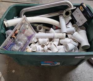 lot 312 image: CONTAINER LOT OF ASSORTED PLUMBING SUPPLIES AS SHOWN. TAKE A LOOK