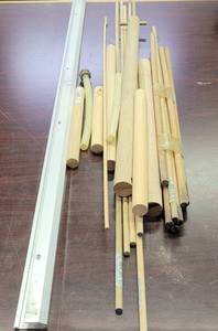 lot 392 image: WOOD DOWELS AND MORE AS SHOWN.