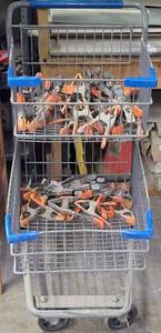 lot 403 image: LOT OF 60 SPRING CLIPS PLUS SHOPPING CART AS SHOWN. (YOUR BID X 60)