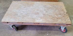 lot 411 image: SHOP MADE FLAT BED DOLLY AS SHOWN. APPROX. 48 L x 27.5 W.