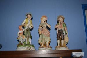 lot 262 image: Boy and Girl Figurines One has Double Sword Mark C-2152
