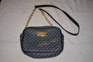 lot 53 image: Michael Kors with Gold Chain and Black Strap, Please Preview