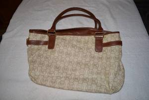 lot 54 image: Michael Kors with Brown Leather Straps, Please Preview