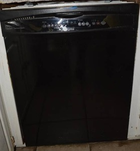 lot 12 image: Kenmore Dishwasher, Clean Dishes were inside