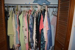 lot 200 image: Contents of Closet Womens Clothes and Jacket, sizes 24-26