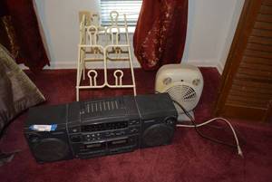 lot 201 image: Magnavox RadioTape Recorder (Broken Antenna), Botech Fan Heater, Plastic Shoe Caddy
