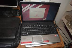 lot 294 image: Compaq Laptop Model CQ61-313US, Targus Laptop Fan and Targus Bag