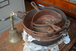 lot 309 image: Cast Iron Skillets (Need Cleaned) and Bell
