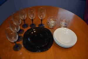 lot 298 image: Dinnerware Black Plates, White Bowls, Clear Dessert Bowls and 6 Blue Stemmed Wine Glasses