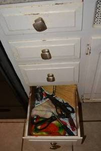 lot 300 image: Contents of Drawers Knives and Cooking Utensils