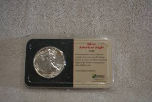 lot 381 image: 1989 Silver American Eagle One Ounce Silver Dollar, Uncirculated