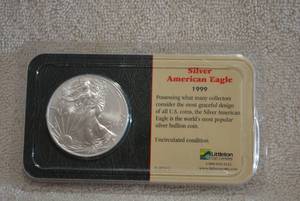 lot 382 image: 1999 Silver American Eagle One Ounce Silver Dollar, Uncirculated