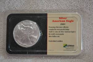 lot 383 image: 2001 Silver American Eagle One Ounce Silver Dollar, Uncirculated