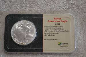 lot 384 image: 2001 Silver American Eagle One Ounce Silver Dollar, Uncirculated